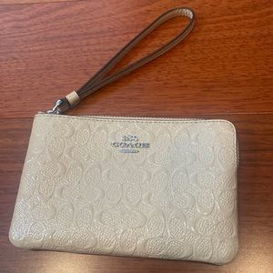 Coach wristlet nude / tan